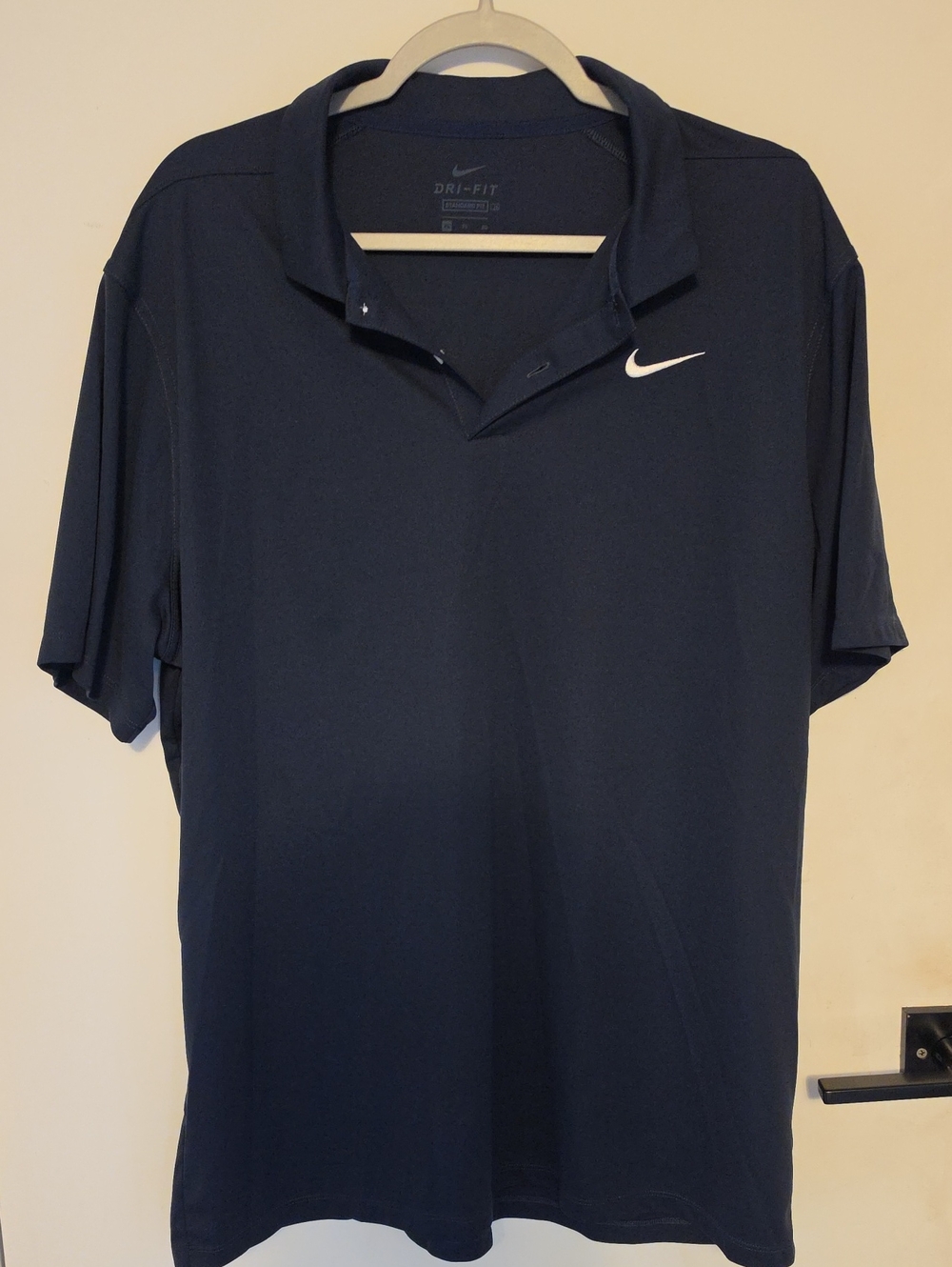 Nike Men's Navy Polo with White Swoosh